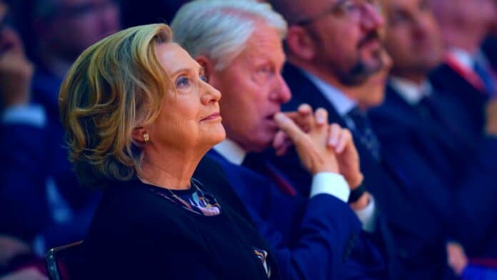 Former-US-president-Bill-Clinton-second-left-and-former-US-secretary-of-state-Hillary-Clinton-Niall-CarsonPool-Photo-via-AP