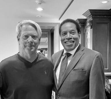 American Faith Founder and CEO Phil Hotsenpiller (left) standing with conservative radio host Larry Elder (right)