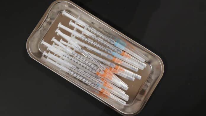 covid vaccine needles syringe covid lawsuit