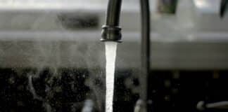 House Dems Defy Party, Back Trump Rollback of Biden Shower Rule water