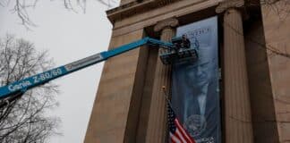 Trump Banner Flies at DOJ Headquarters